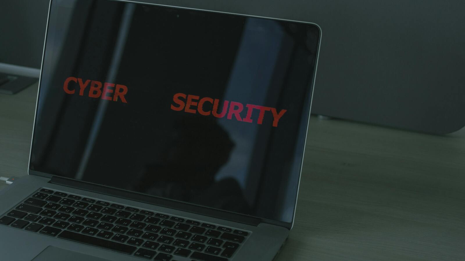 Laptop screen displaying cyber security text, used for the browser prompt injection article